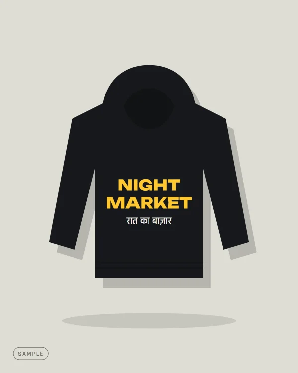 Black hoodie reading "NIGHT MARKET" in yellow with Hindi text below (sample artwork)